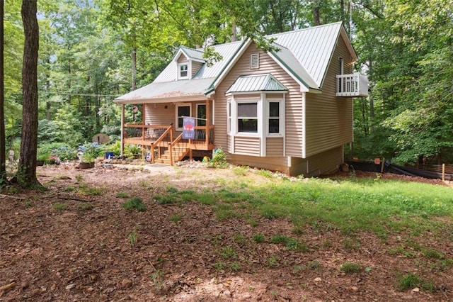 141 Mills Creek Path, Hiram, GA 30141 - chalet / cabin with metal roof and a porch