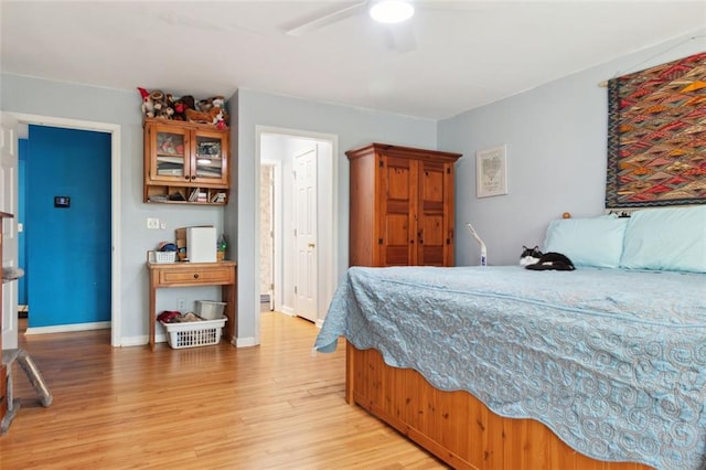 141 Mills Creek Path, Hiram, GA 30141 - bedroom with light wood finished floors, baseboards, and ceiling fan