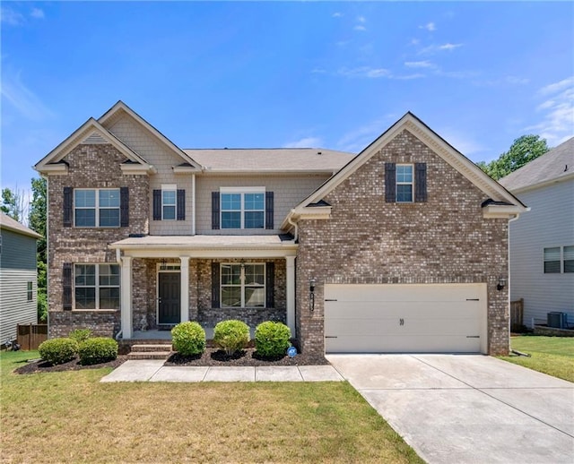 craftsman inspired home featuring a porch, brick siding, a front lawn, concrete driveway, and an attached garage