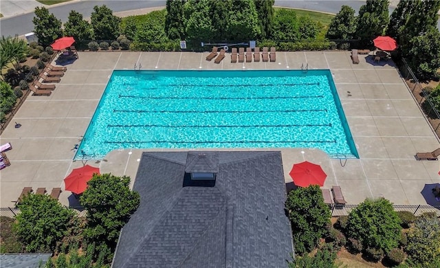 community pool featuring fence