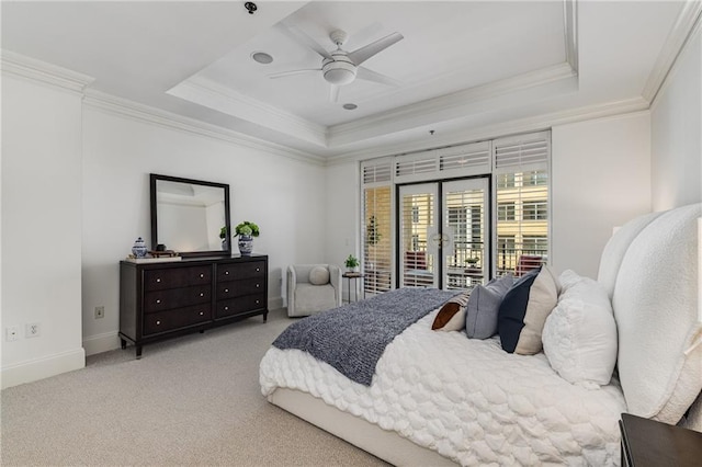 bedroom with access to outside, a raised ceiling, carpet, baseboards, and ornamental molding