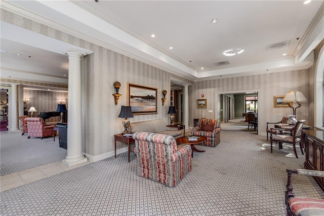 carpeted living area with ornate columns, recessed lighting, visible vents, and wallpapered walls