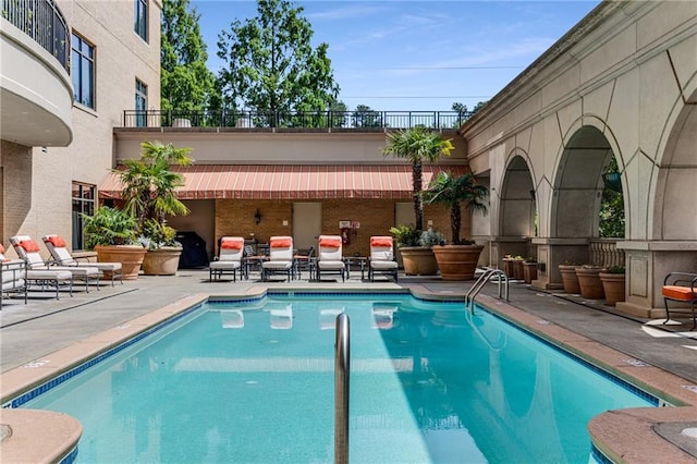 pool featuring a patio