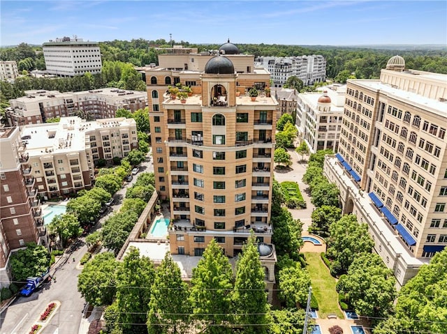 birds eye view of property with a city view