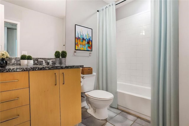 full bath with toilet, tile patterned floors, shower / bath combo, and vanity