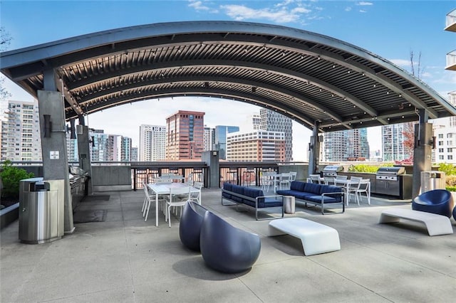 exterior space with a view of city and an outdoor living space