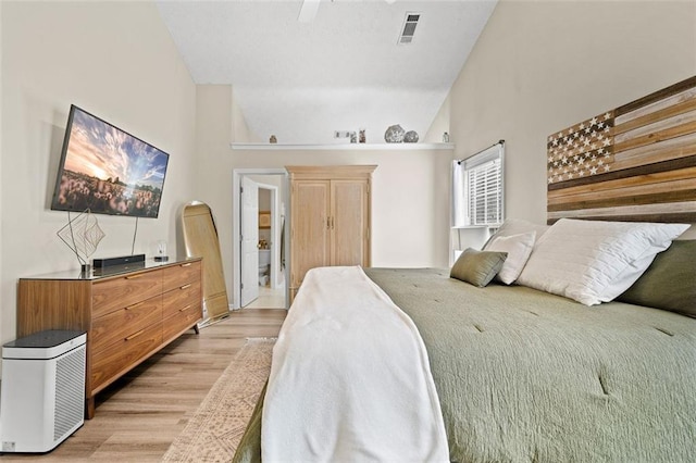 1865 Morgans Run Trl, Buford, GA 30519 - bedroom with light wood-style floors, a ceiling fan, and vaulted ceiling