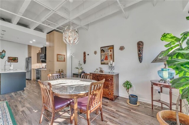 dining space featuring light wood-type flooring