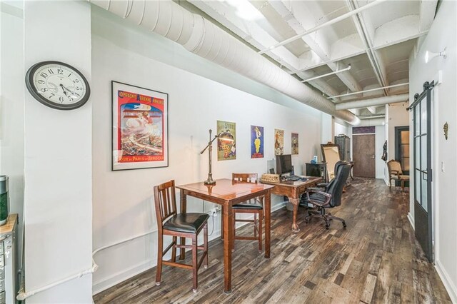 dining area featuring dark hardwood / wood-style flooring