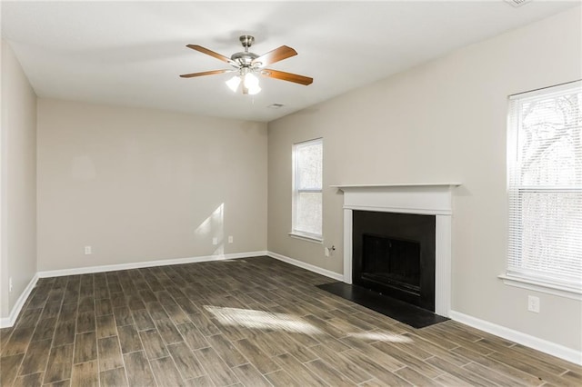 unfurnished living room featuring ceiling fan