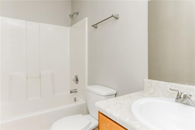 full bathroom with toilet, shower / bathing tub combination, and vanity