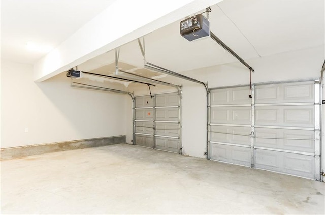 garage featuring a garage door opener