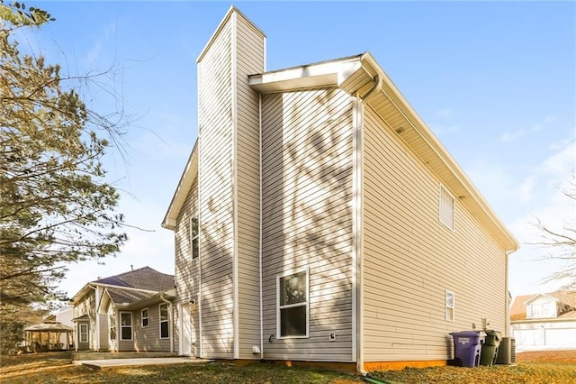 rear view of property featuring a patio