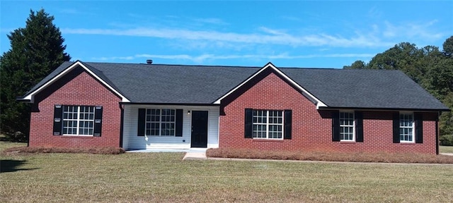 ranch-style house with a front yard