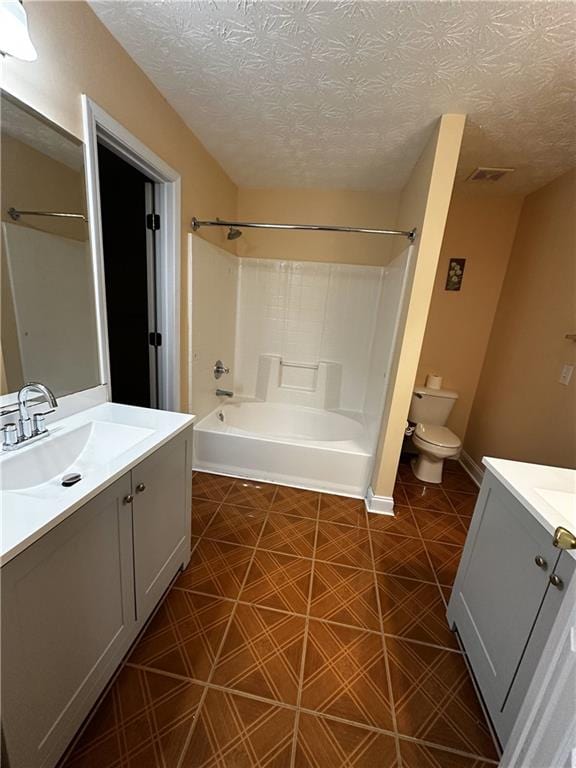 5026 Limerick Ln, Flowery Branch, GA 30542 - full bath with vanity,  shower combination, a textured ceiling, and tile patterned floors
