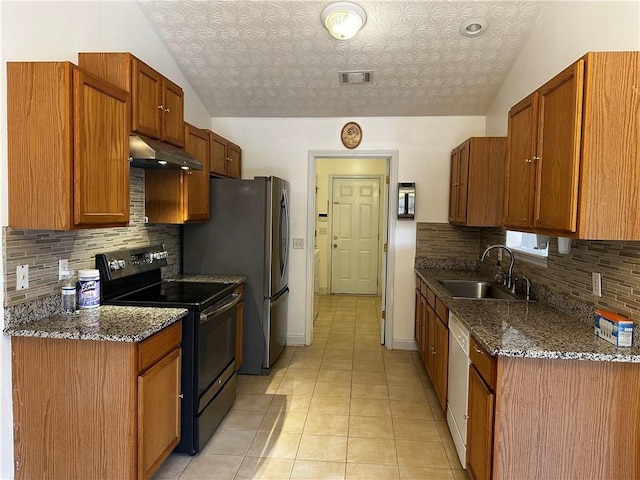 5026 Limerick Ln, Flowery Branch, GA 30542 - kitchen featuring black range with electric cooktop, under cabinet range hood, dark stone counters, backsplash, and an ornate ceiling