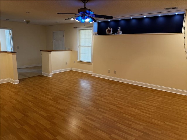 5026 Limerick Ln, Flowery Branch, GA 30542 - unfurnished room with a ceiling fan and wood finished floors