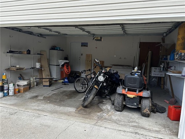 5026 Limerick Ln, Flowery Branch, GA 30542 - garage with a garage door opener