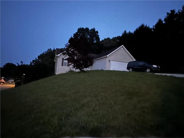 5026 Limerick Ln, Flowery Branch, GA 30542 - view of property exterior featuring a lawn and a garage