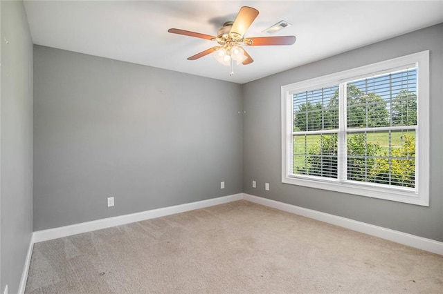 208 Stonington Dr, Mount Airy, GA 30563 - spare room with baseboards, light carpet, and ceiling fan