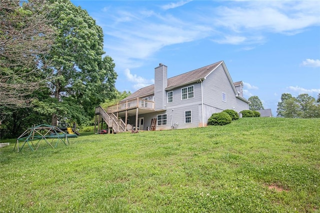 208 Stonington Dr, Mount Airy, GA 30563 - rear view of house with stairway, a deck, a chimney, and a yard