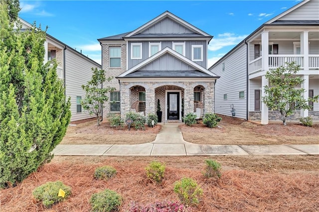 4658 Electric Ave SW, Mableton, GA 30126 - craftsman-style house featuring a porch, board and batten siding, and stone siding