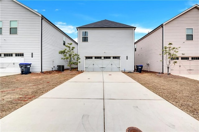 4658 Electric Ave SW, Mableton, GA 30126 - exterior space featuring an attached garage and central AC unit