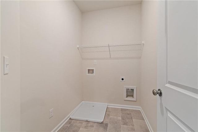 laundry room featuring electric dryer hookup and washer hookup