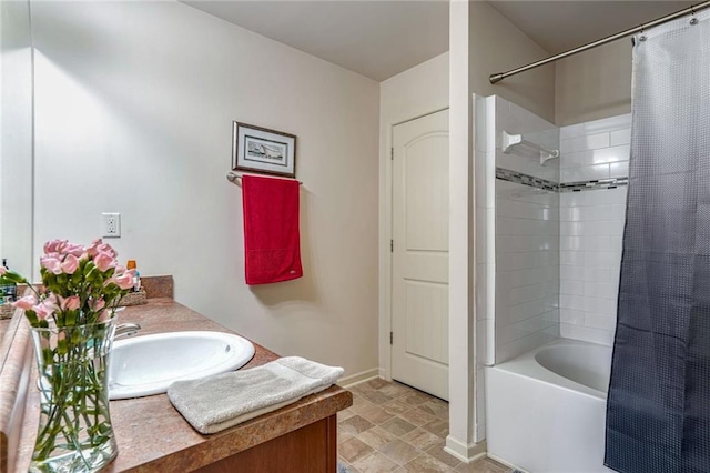 bathroom with vanity and shower / bath combo with shower curtain