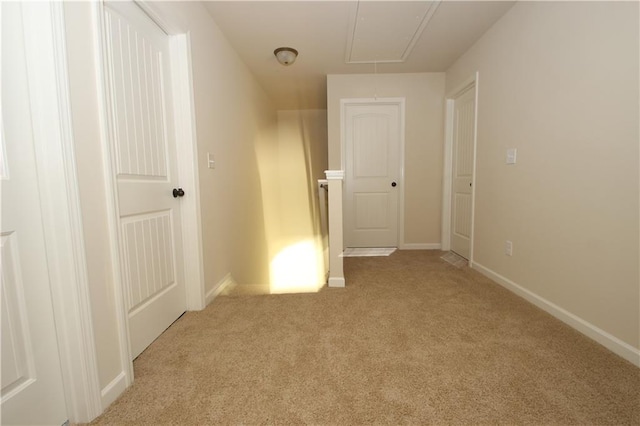 interior space featuring light colored carpet