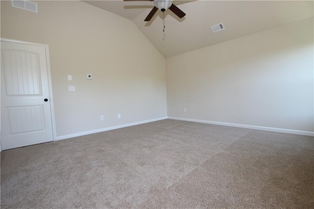 empty room with carpet flooring, ceiling fan, and lofted ceiling