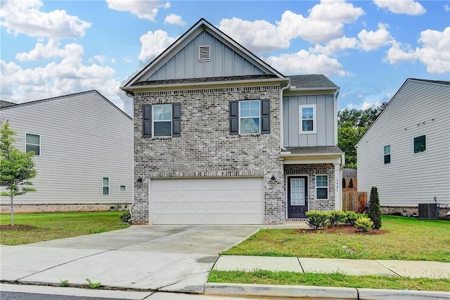 1431 Winding Ridge Trl, Buford, GA 30548 - view of front of property with board and batten siding, brick siding, a garage, and concrete driveway
