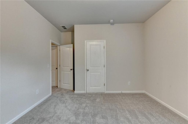 1431 Winding Ridge Trl, Buford, GA 30548 - unfurnished bedroom featuring carpet floors and baseboards