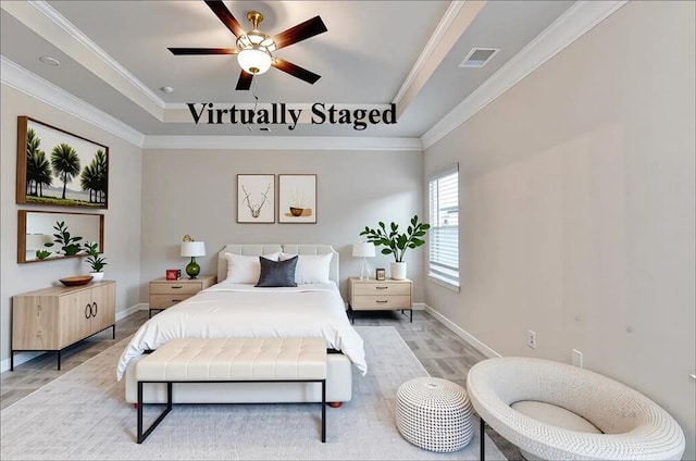 1431 Winding Ridge Trl, Buford, GA 30548 - bedroom with a tray ceiling, crown molding, light wood finished floors, and ceiling fan
