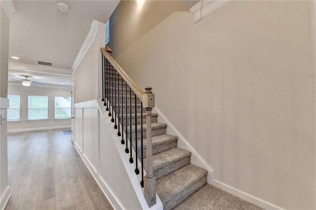 1431 Winding Ridge Trl, Buford, GA 30548 - staircase featuring ceiling fan, wood finished floors, crown molding, and recessed lighting
