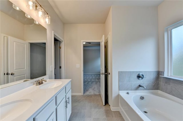 1431 Winding Ridge Trl, Buford, GA 30548 - full bathroom with double vanity, healthy amount of natural light, a bath, and tile patterned flooring