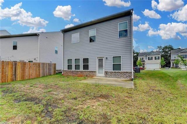 1431 Winding Ridge Trl, Buford, GA 30548 - back of property featuring a patio and brick siding