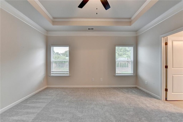 1431 Winding Ridge Trl, Buford, GA 30548 - unfurnished room featuring carpet floors, a raised ceiling, ornamental molding, and a ceiling fan