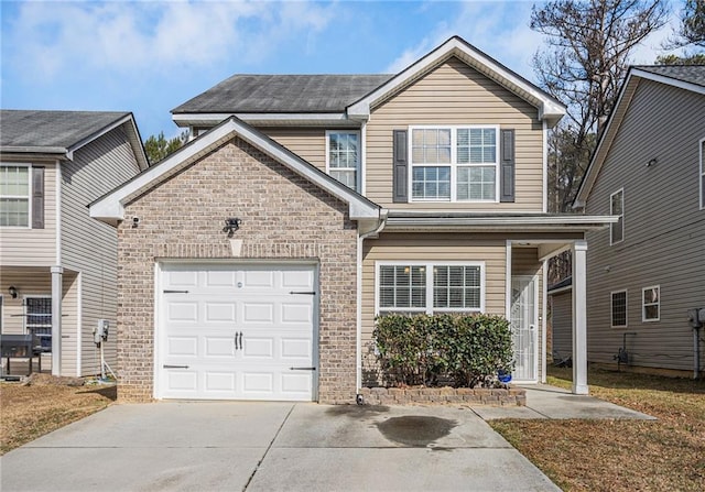 traditional home featuring a garage, concrete driveway, and brick siding