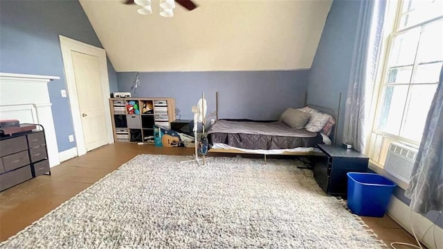 bedroom featuring vaulted ceiling, wood finished floors, and cooling unit