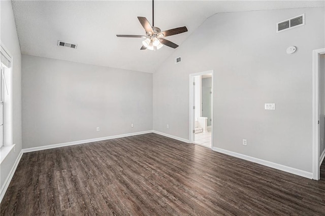 unfurnished room featuring visible vents, dark wood-type flooring, and baseboards