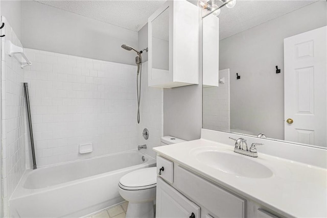 full bath with toilet, vanity, a textured ceiling, and shower / tub combination