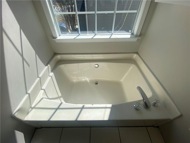 full bathroom with a bath