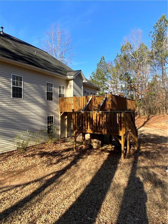 view of yard with a wooden deck