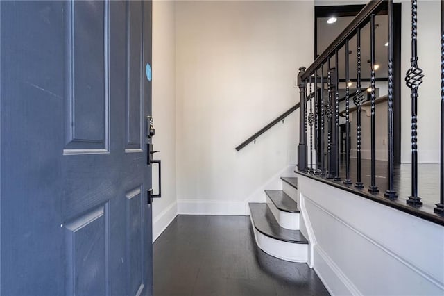 2767 Durham Dr NE, Atlanta, GA 30319 - foyer featuring baseboards, stairs, and dark wood-type flooring