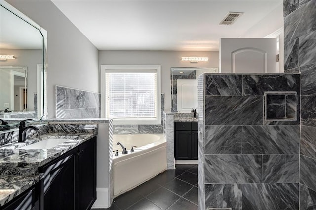 2767 Durham Dr NE, Atlanta, GA 30319 - bathroom featuring a bath, two vanities, a walk in shower, and tile patterned floors