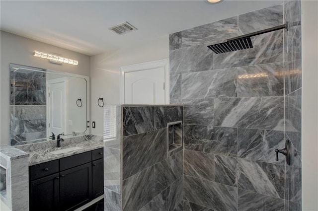 2767 Durham Dr NE, Atlanta, GA 30319 - full bathroom featuring vanity and a tile shower