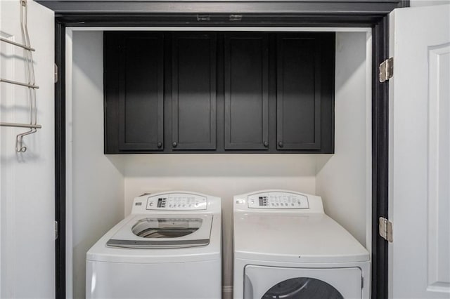 2767 Durham Dr NE, Atlanta, GA 30319 - washroom with washer and dryer and cabinet space