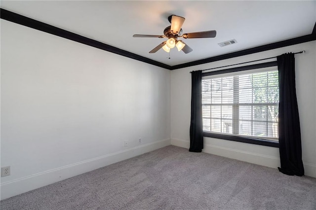 2767 Durham Dr NE, Atlanta, GA 30319 - unfurnished room with carpet flooring, a ceiling fan, baseboards, and crown molding