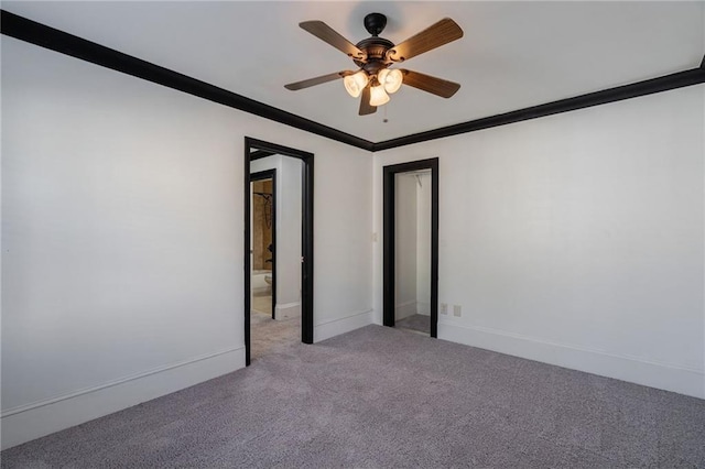 2767 Durham Dr NE, Atlanta, GA 30319 - carpeted empty room with a ceiling fan, ornamental molding, and baseboards